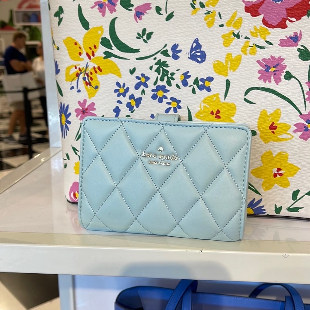 Kate Spade Carey Medium Compartment Bifold Wallet
COLOR: Turquoise - Picture 1 of 16